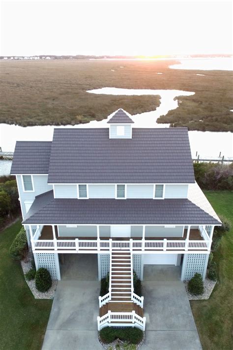 beach house balcony metal roof|best roof for beach house.